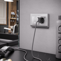 Розетка двойная влагозащищенная с заземлением и со шторками, без рамки с крышкой Werkel серебряный рифленый W1172209